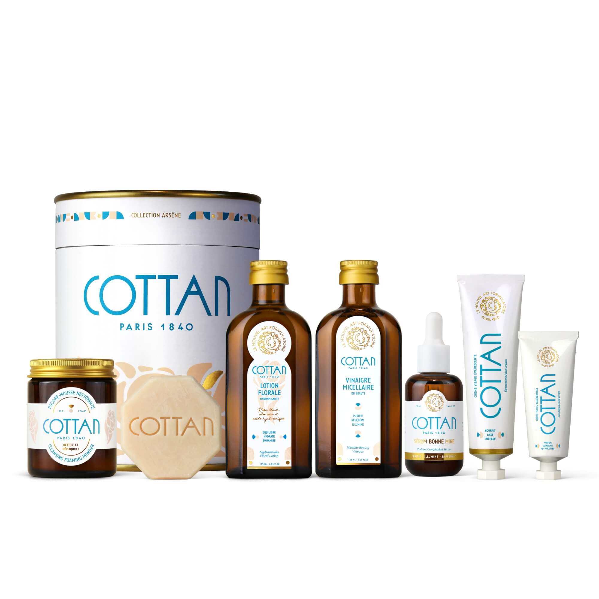Vue de face de la Routine Complète COTTAN Paris 1840 regroupant l’ensemble des soins visage : poudre-mousse nettoyante, savon visage dulcifié, lotion florale hydramisante, vinaigre micellaire de beauté, sérum Bonne Mine et crème visage Évanescente. Présentation complète des produits alignés sur fond clair.
