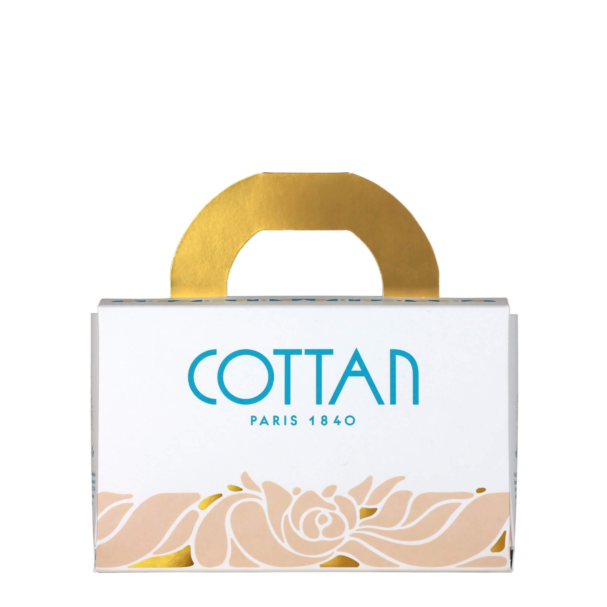 Gros plan sur le coffret cadeau COTTAN "Rituel Arsène" pour le soin du visage en format voyage, vue de face. L'avant de la boîte blanche est décoré d'une rose dorée et du logo bleu COTTAN, symbolisant la riche histoire et le luxe de la marque.