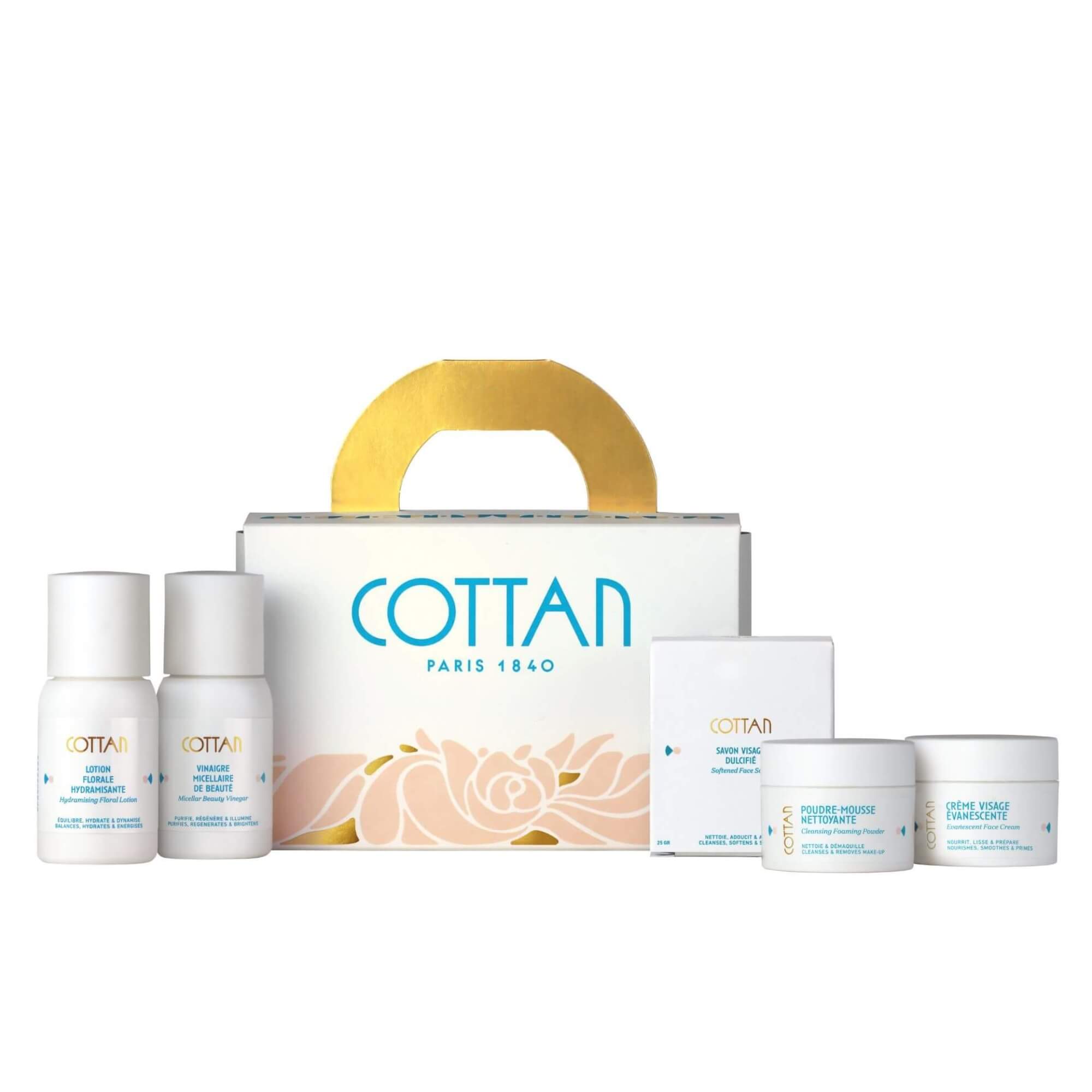 Vista frontal de los productos del estuche de viaje Rituel Arsène de COTTAN presentados alineados con sus envases, formatos de viaje dedicados al ritual de cuidado facial.
